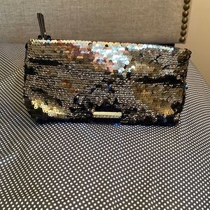 Never used Victoria secret unique gold or silver sequins evening bag .